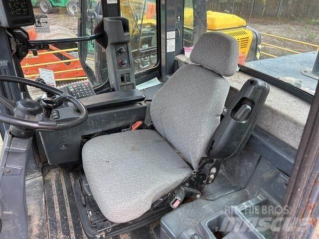John Deere 544K Фронтальні навантажувачі