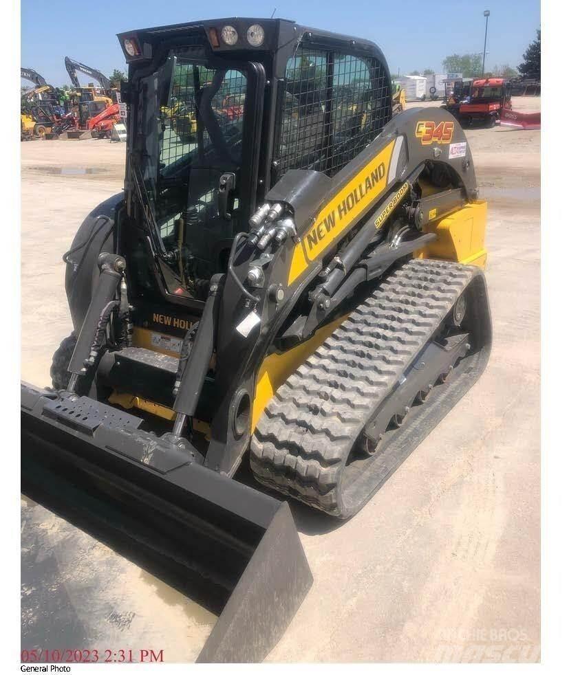 New Holland C345 Міні-навантажувачі