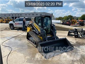 New Holland C345 Міні-навантажувачі