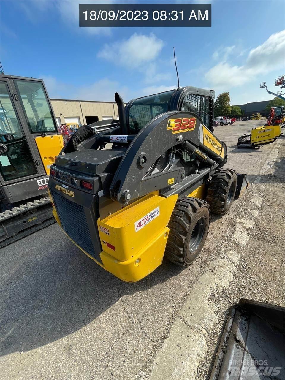 New Holland L328 Міні-навантажувачі