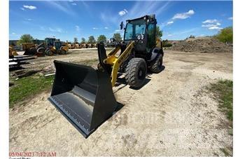 New Holland W80C Фронтальні навантажувачі