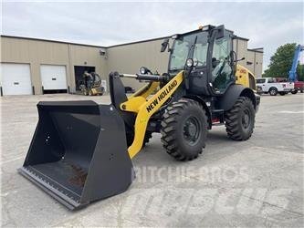 New Holland W80C Фронтальні навантажувачі