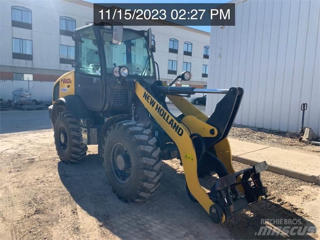 New Holland W80C Фронтальні навантажувачі