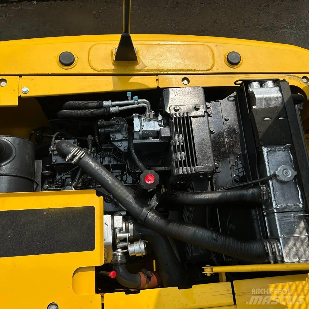 Komatsu 130 Гусеничні екскаватори
