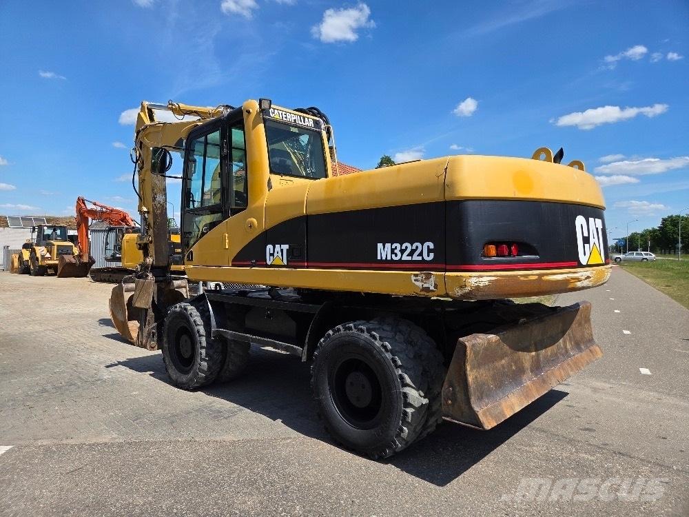 CAT M322C Колісні екскаватори