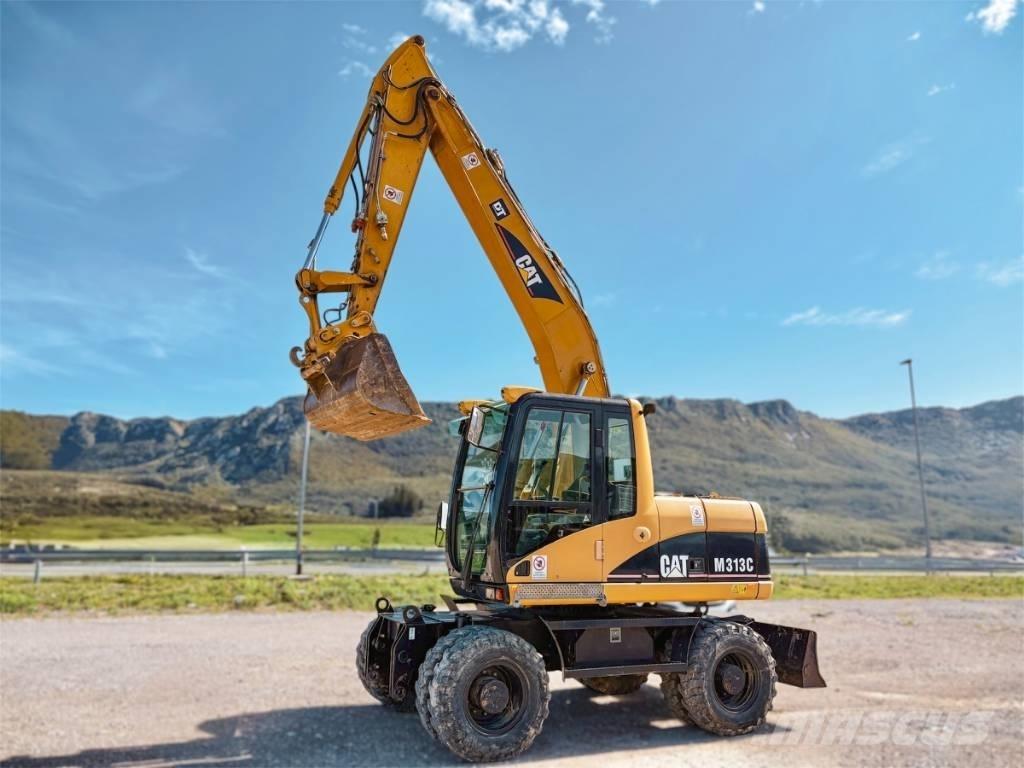 CAT M 313 C Колісні екскаватори