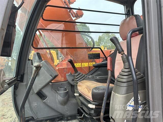 Hitachi ZX 138 Гусеничні екскаватори