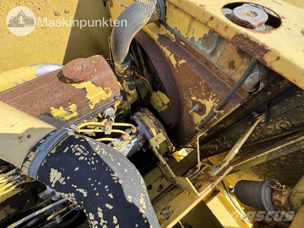 New Holland 1530 Зернозбиральні комбайни