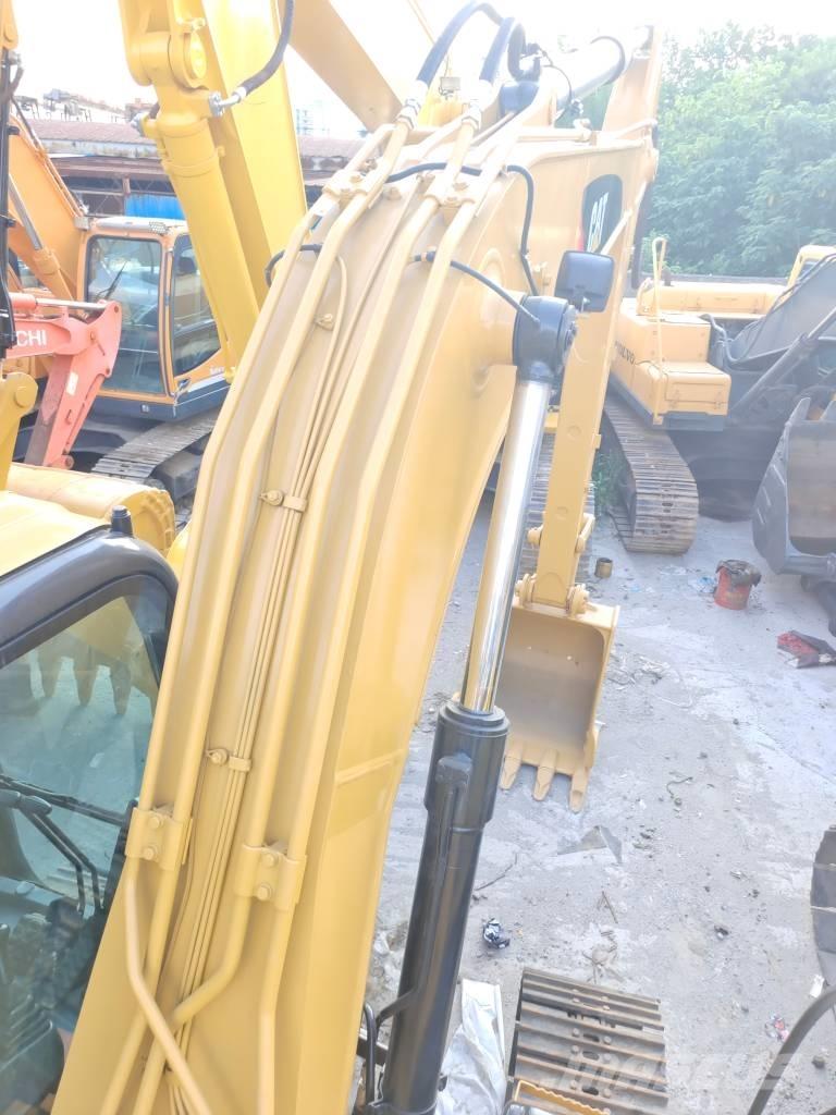 CAT 312 Гусеничні екскаватори