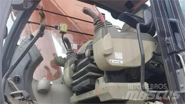 Hitachi ZX 670 Гусеничні екскаватори