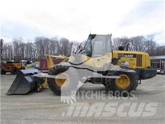 Komatsu WA320 Фронтальні навантажувачі