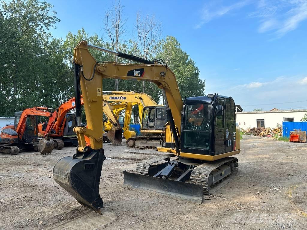 CAT 308E Гусеничні екскаватори