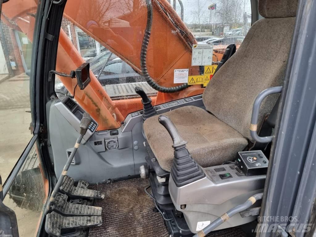 Doosan DX 225 LC Гусеничні екскаватори