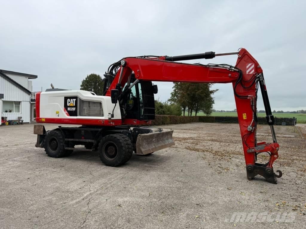 CAT M320F Колісні екскаватори