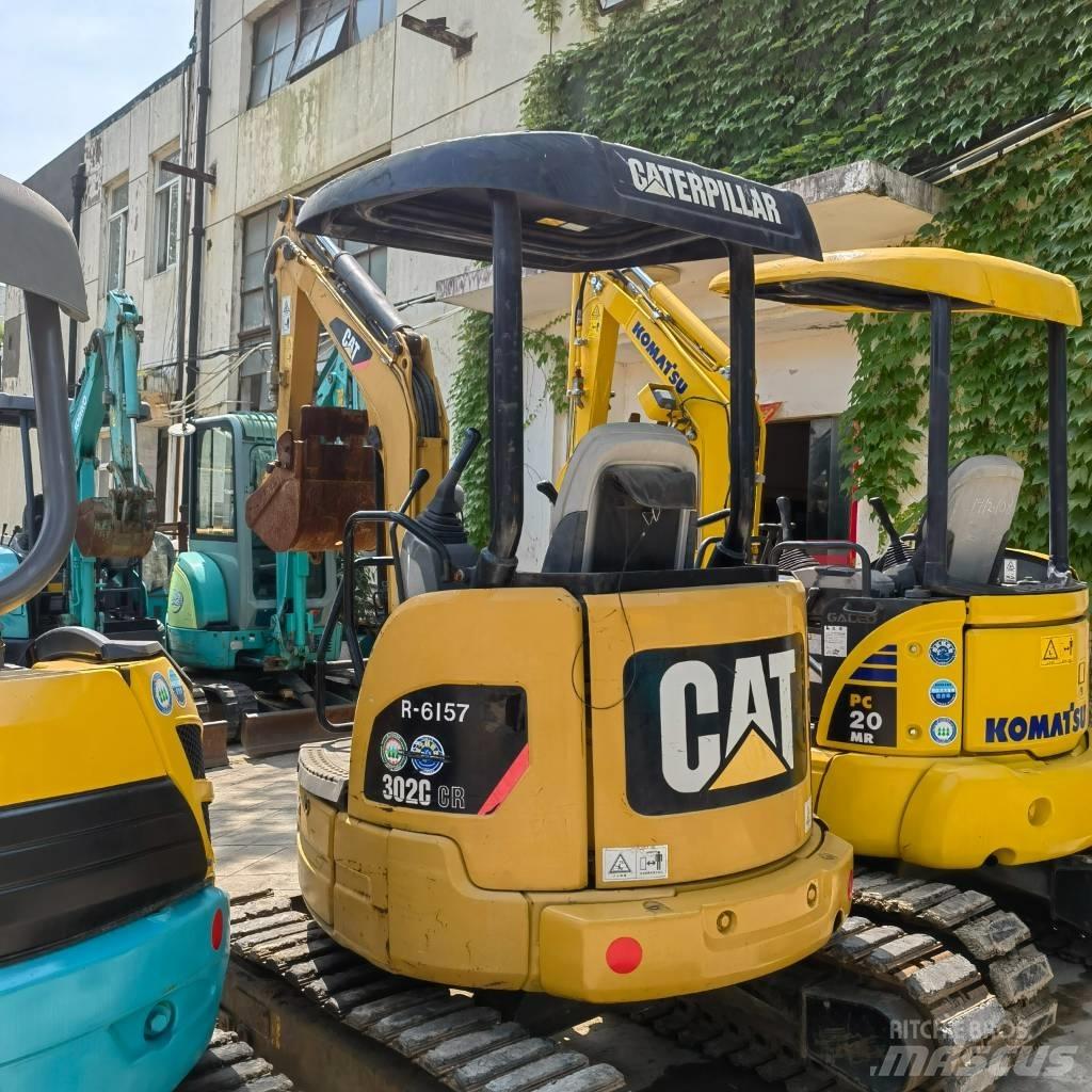 CAT 302 Міні-екскаватори < 7т