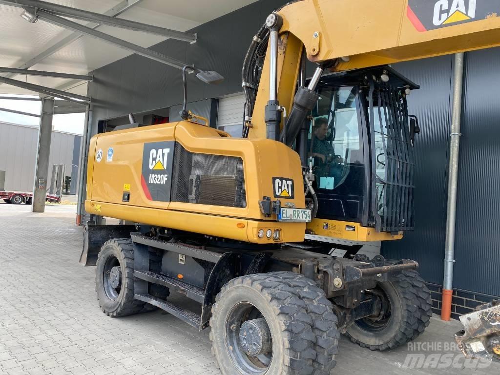 CAT M 320 F Колісні екскаватори