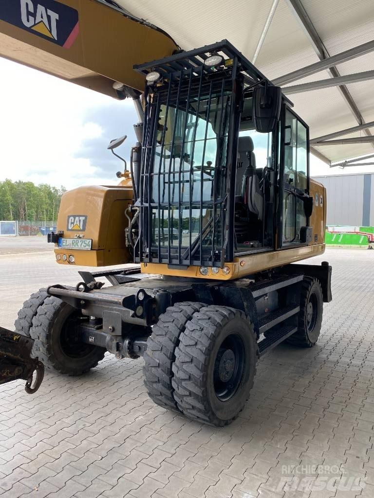 CAT M 320 F Колісні екскаватори