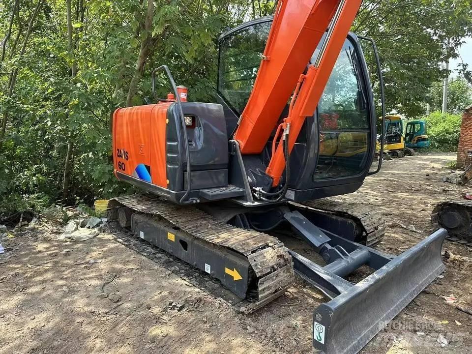 Hitachi ZX60 Міні-екскаватори < 7т
