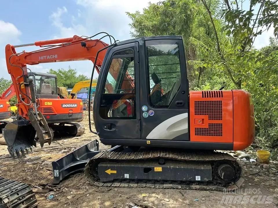 Hitachi ZX60 Міні-екскаватори < 7т