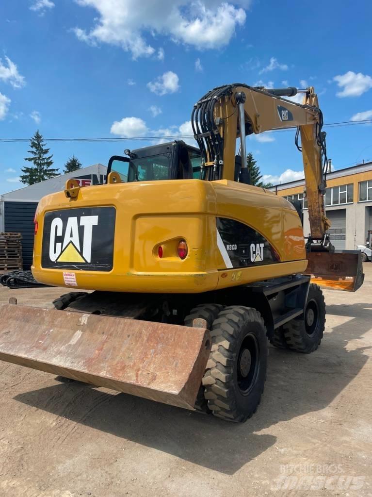 CAT M 313 D Колісні екскаватори