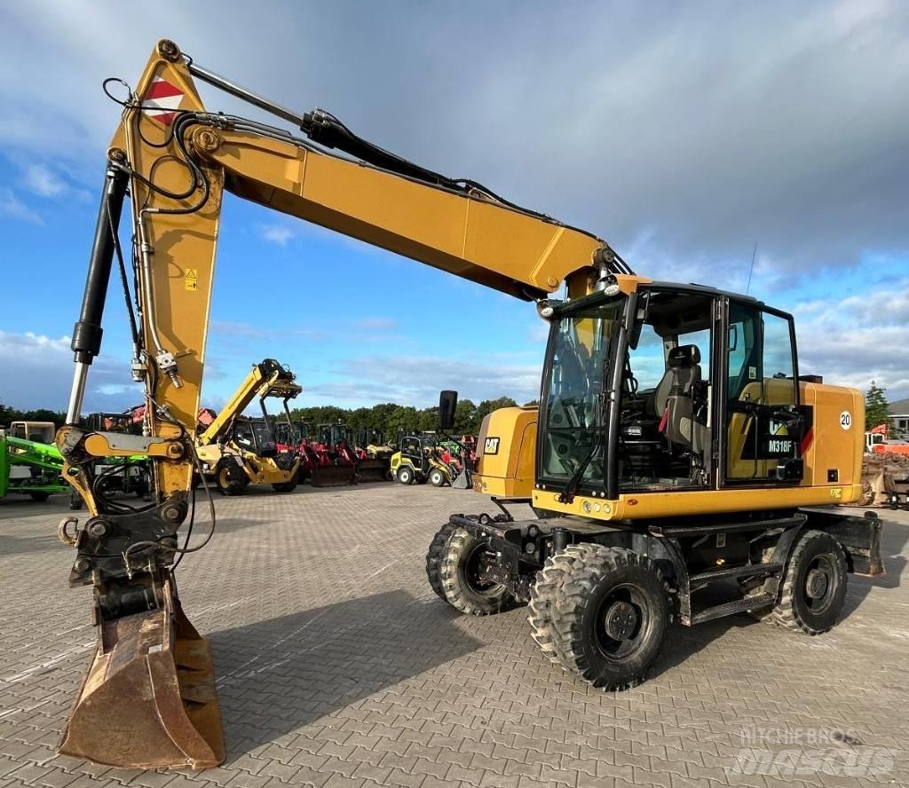 CAT M 318 F Колісні екскаватори