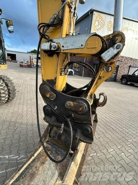 CAT M 318 F Колісні екскаватори