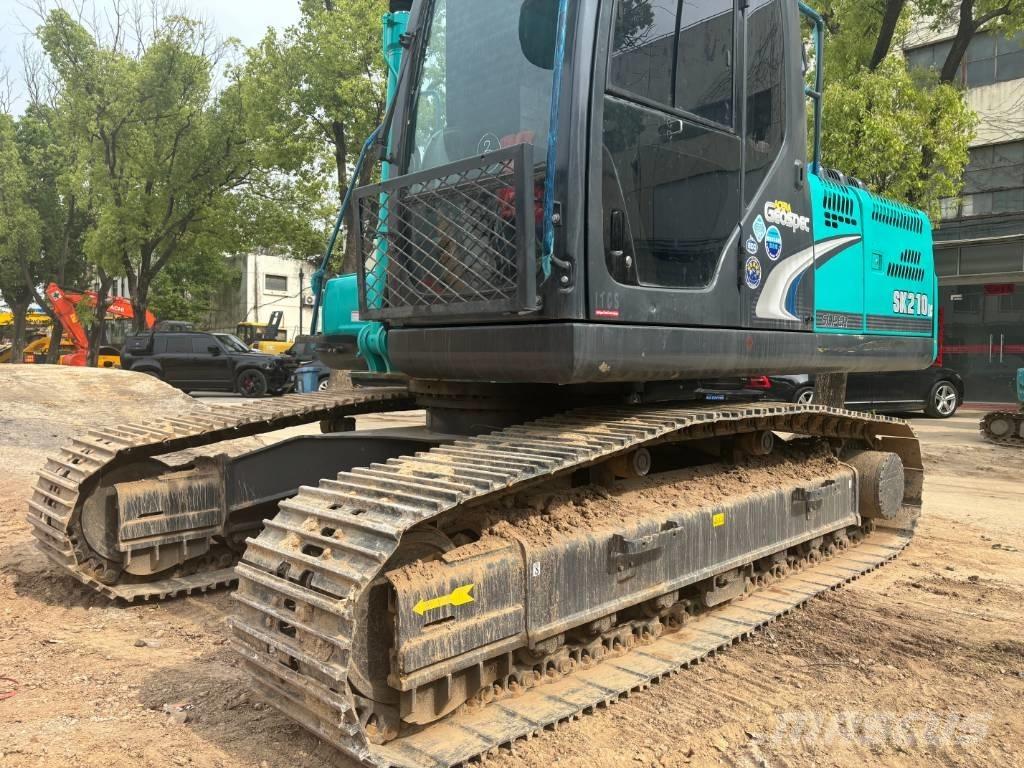 Kobelco SK 210 Гусеничні екскаватори