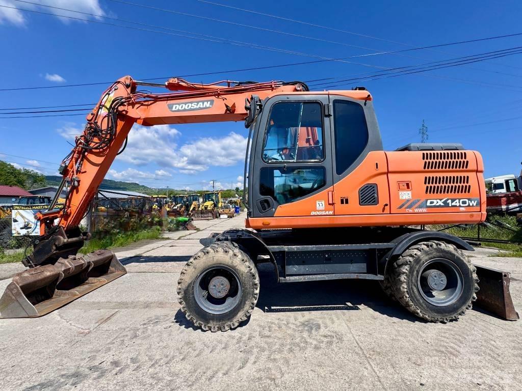 Doosan DX 140 W-3 Колісні екскаватори