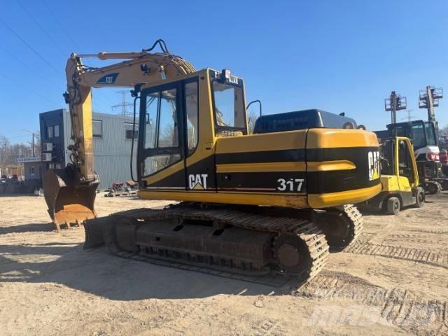 CAT 317 B L Гусеничні екскаватори