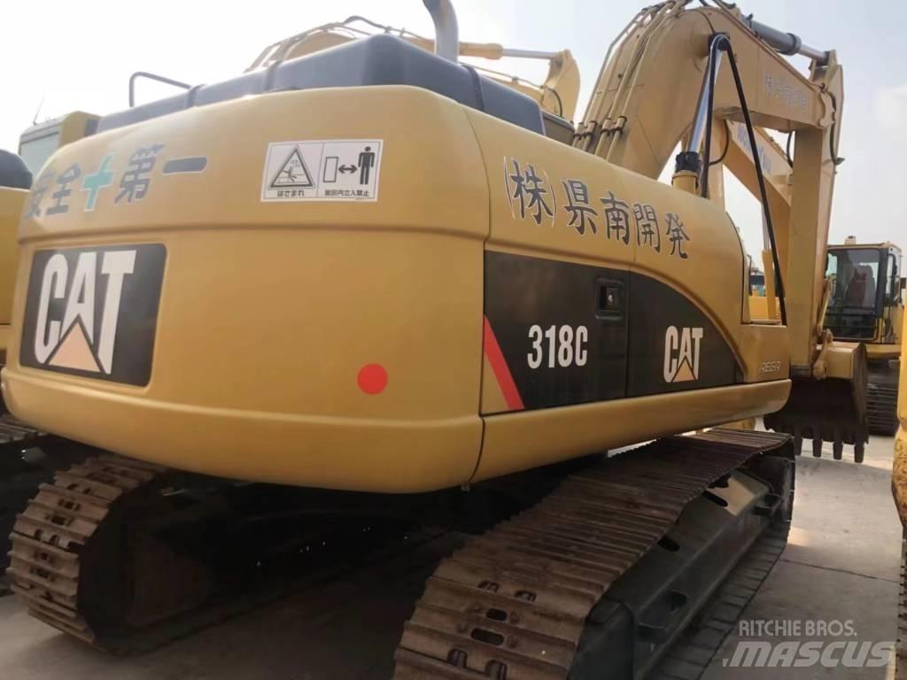 CAT 318C Гусеничні екскаватори