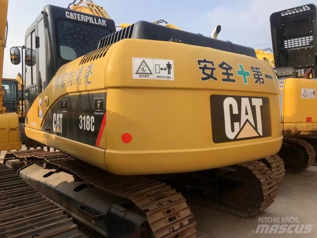 CAT 318C Гусеничні екскаватори
