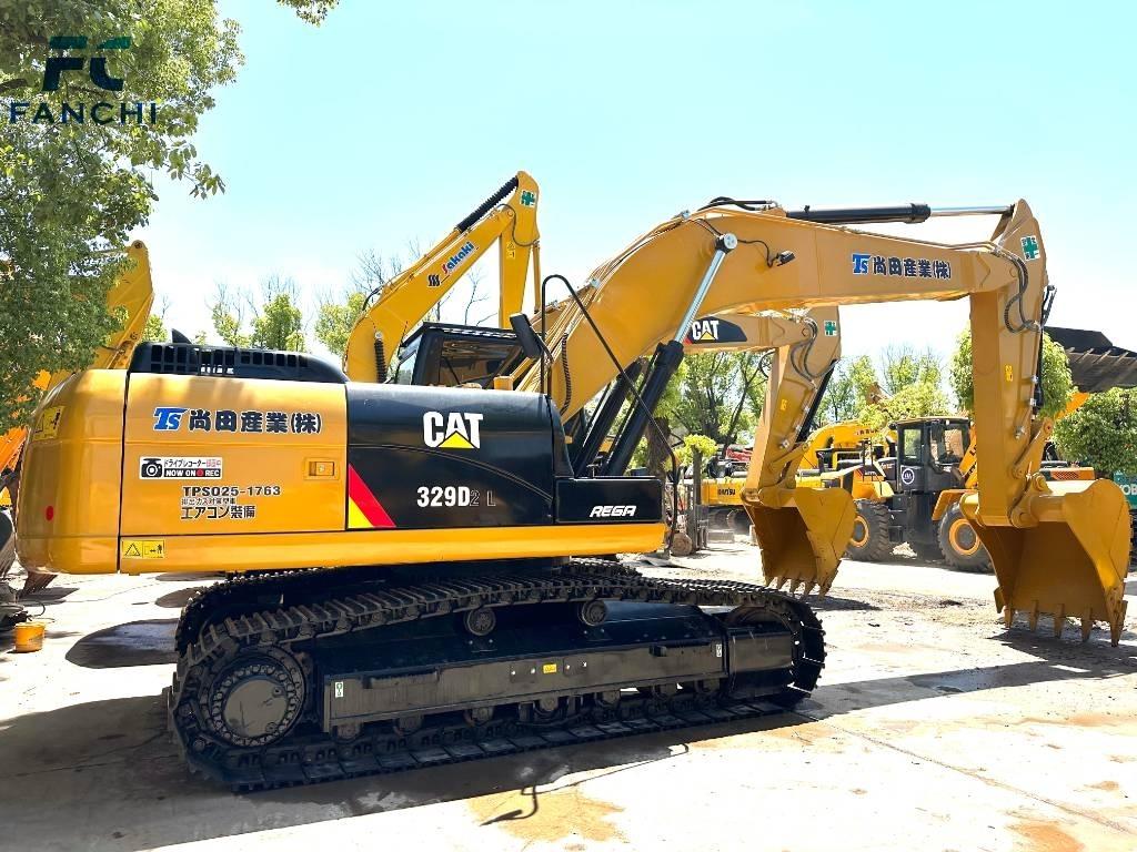 CAT 329 Гусеничні екскаватори