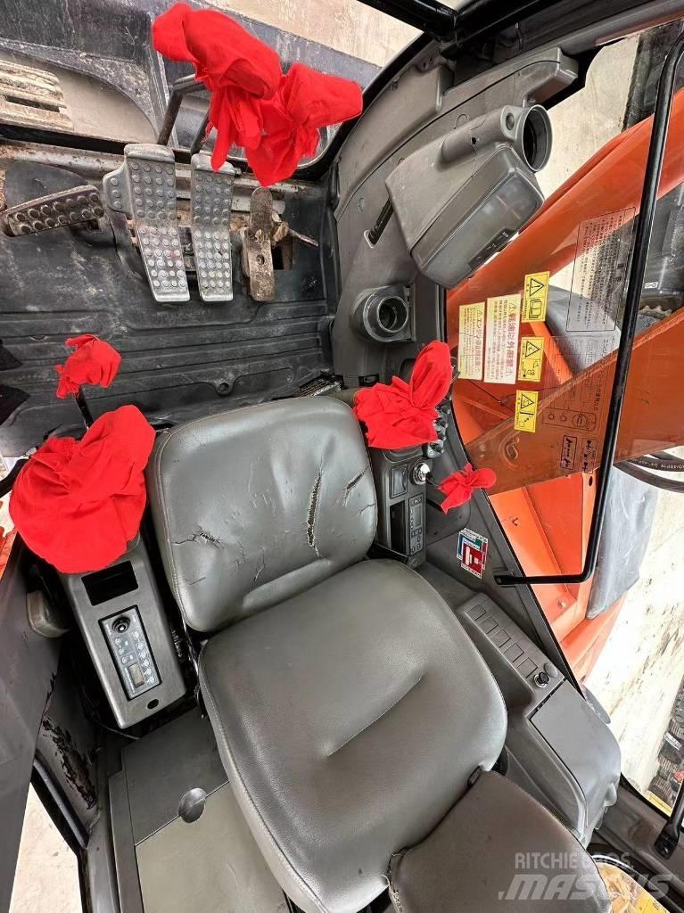 Hitachi ZX 75 Гусеничні екскаватори
