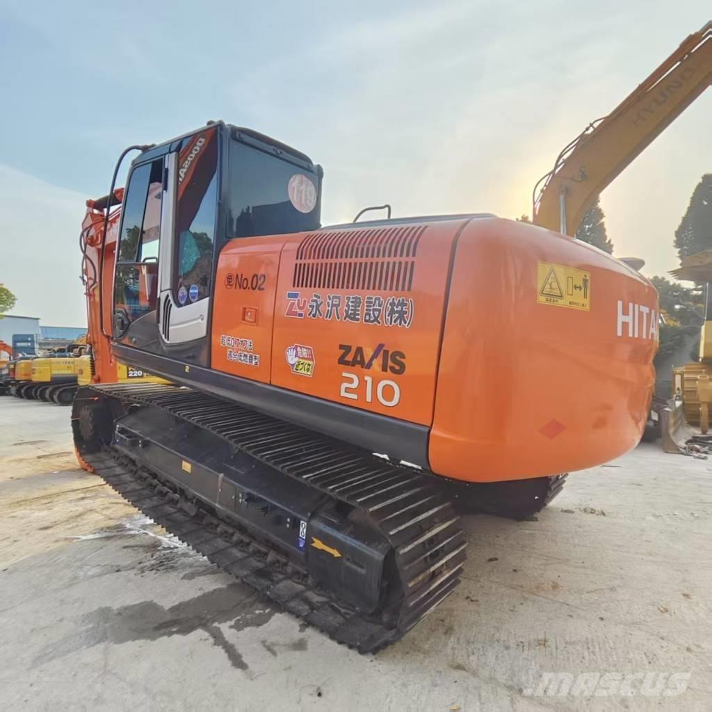 Hitachi ZX 210 Гусеничні екскаватори