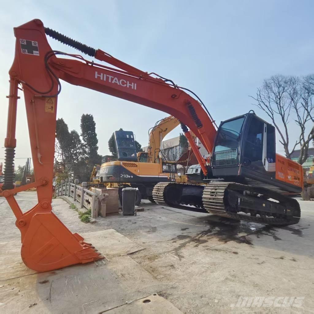 Hitachi ZX 210 Гусеничні екскаватори