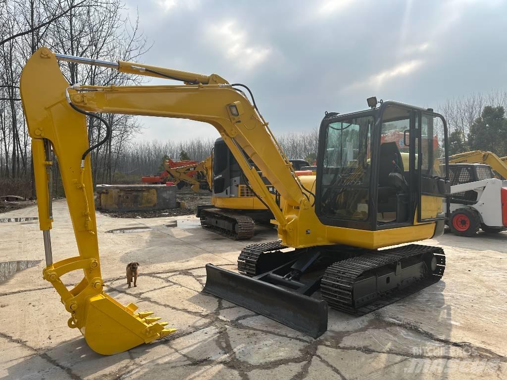 Komatsu PC56 Гусеничні екскаватори