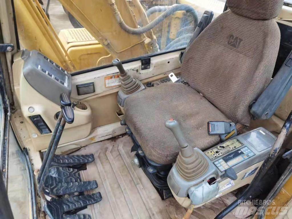 CAT 312 B Гусеничні екскаватори