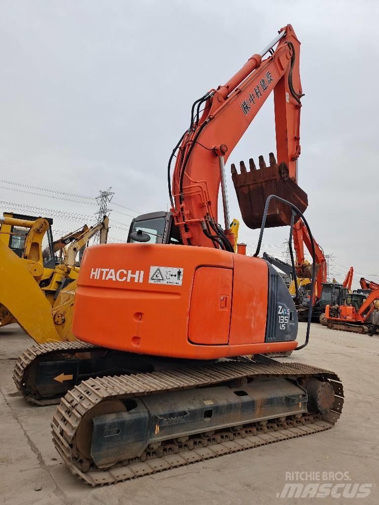 Hitachi ZX 135 US Гусеничні екскаватори