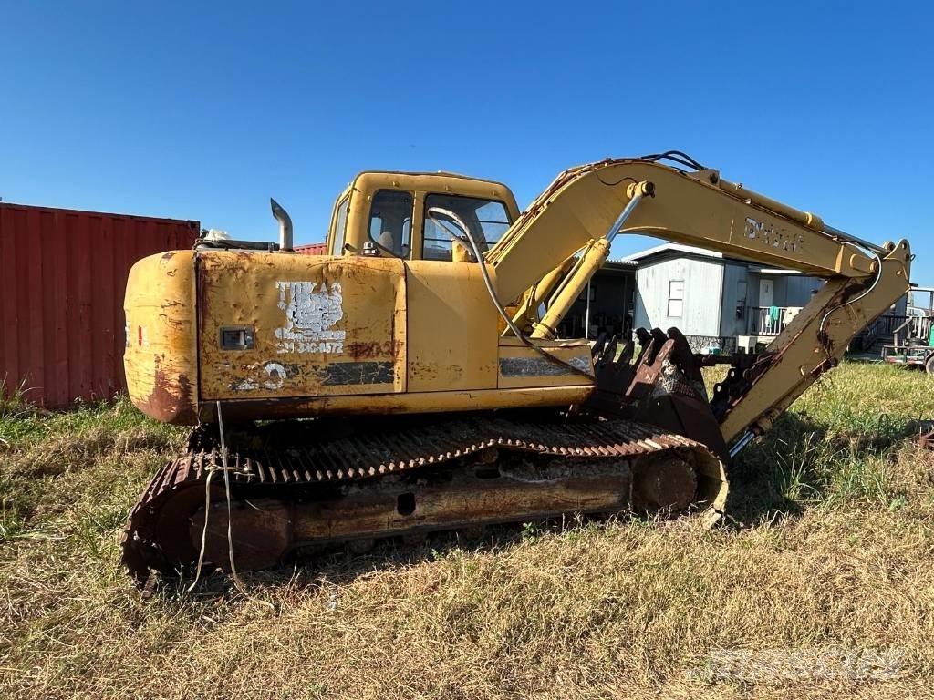 John Deere 120 Гусеничні екскаватори