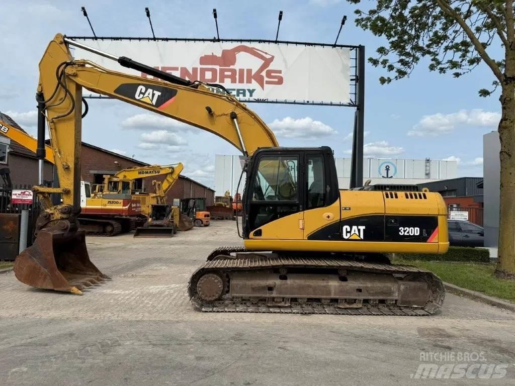 CAT 320DL Гусеничні екскаватори