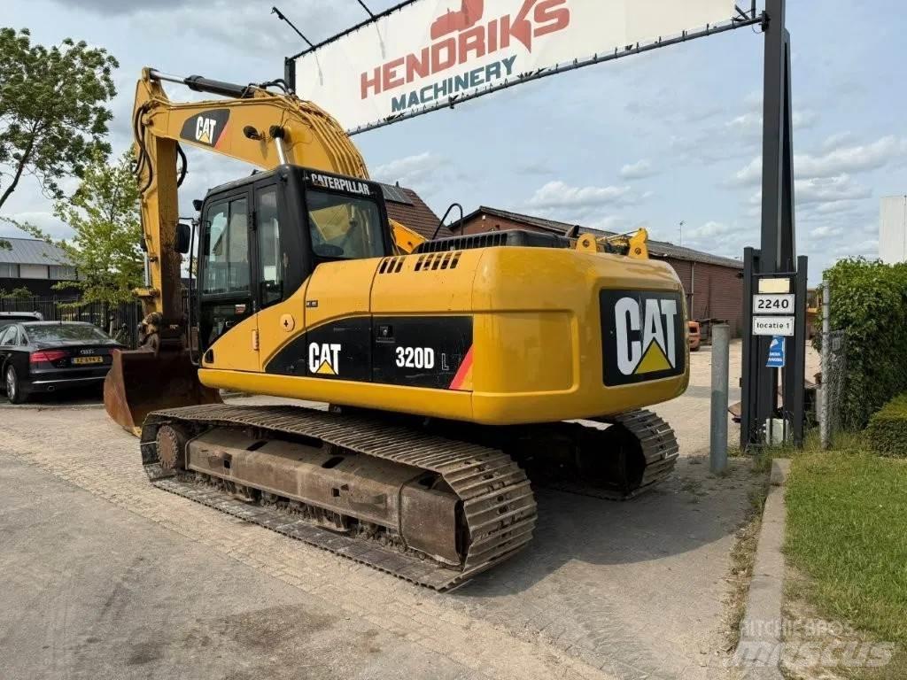 CAT 320DL Гусеничні екскаватори