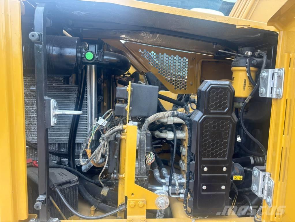 CAT 310 Гусеничні екскаватори