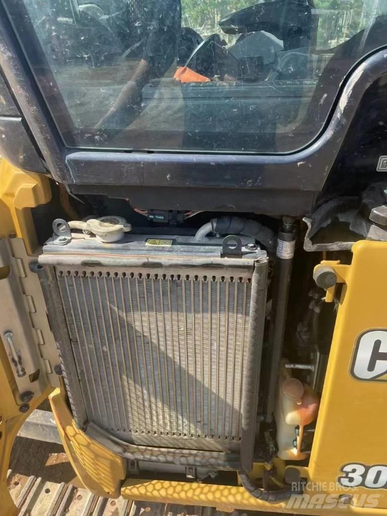 CAT 302 Міні-екскаватори < 7т
