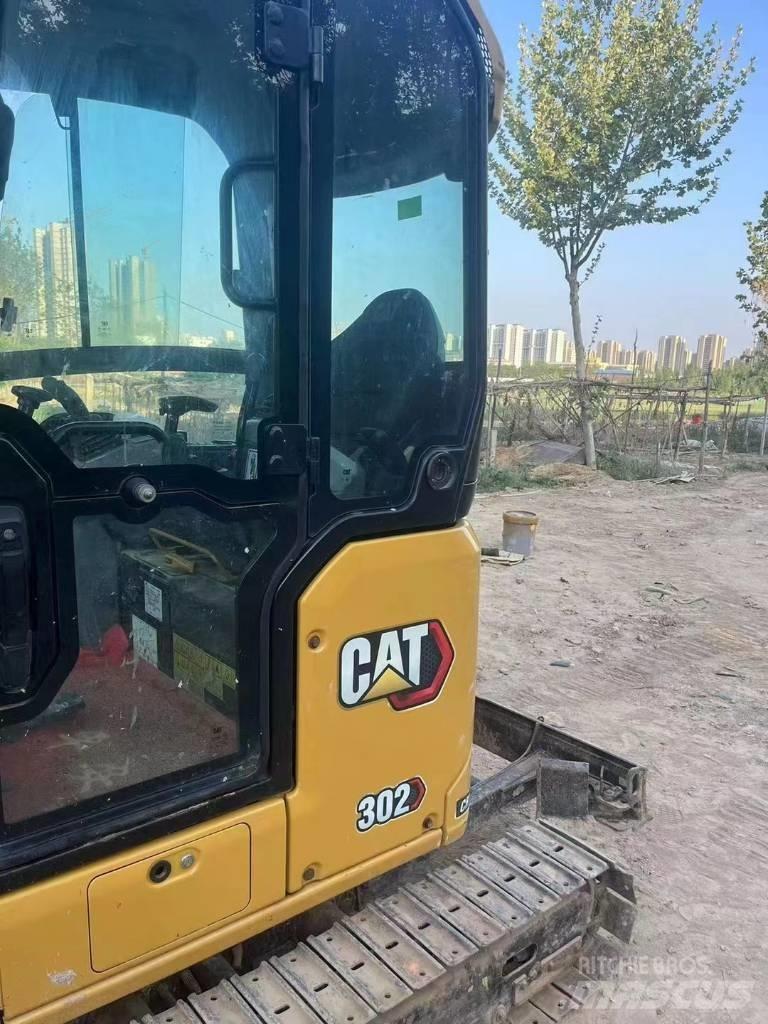 CAT 302 Міні-екскаватори < 7т