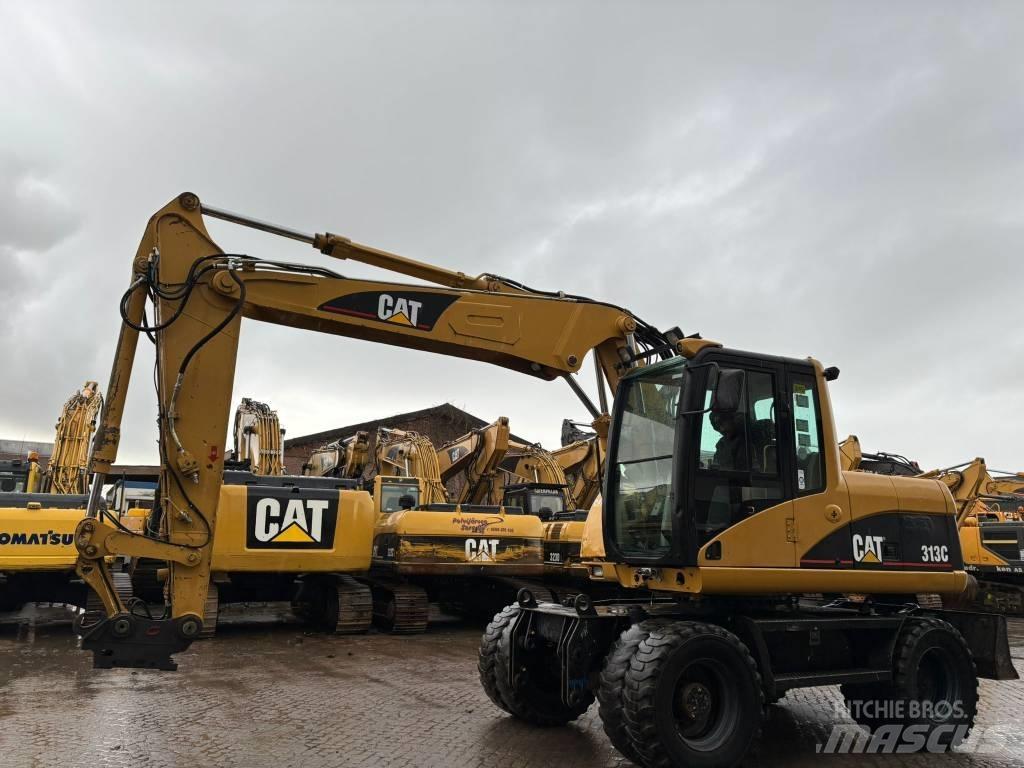 CAT M 313 C Колісні екскаватори