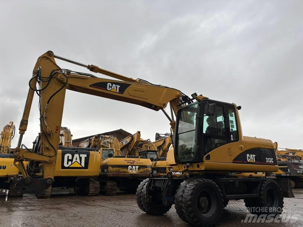 CAT M 313 C Колісні екскаватори