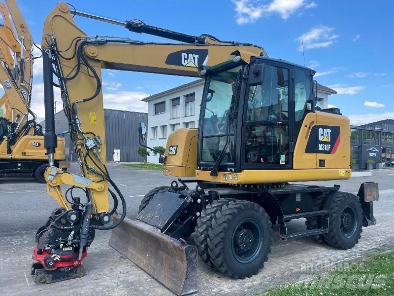 CAT M 315 F Колісні екскаватори