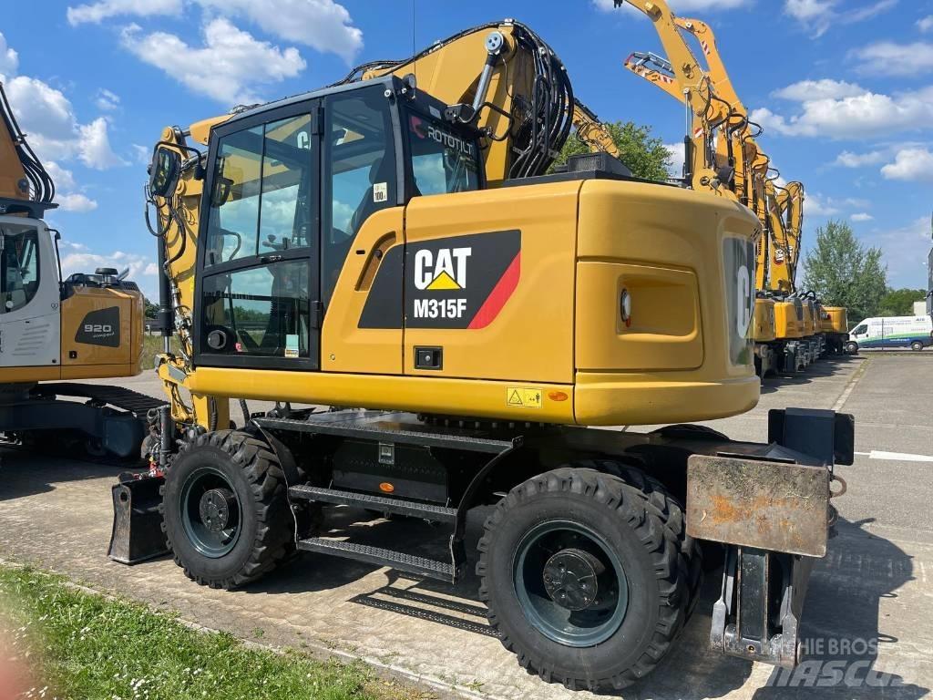 CAT M 315 F Колісні екскаватори