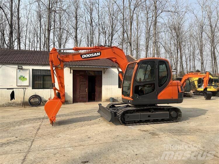 Doosan DX 75 Міні-екскаватори < 7т