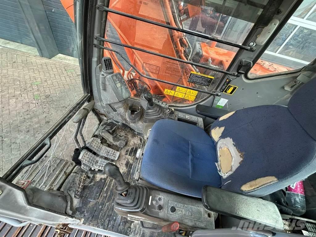 Hitachi ZX110 Середні екскаватори 7т. - 12т.